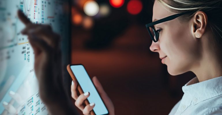Interactive,Kiosk,With,Public,Transport,Subway,Map.female,Standing,At,Big